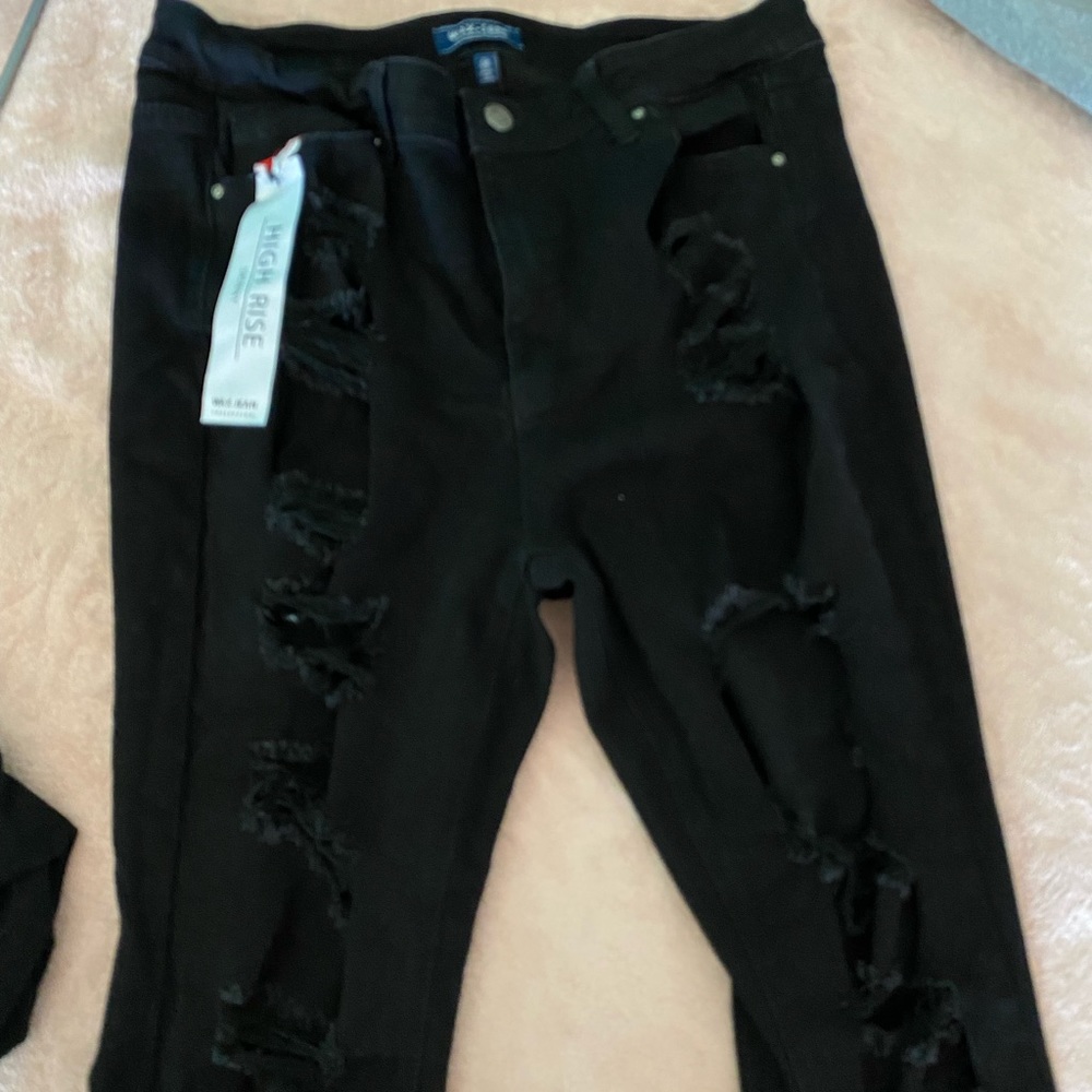 Skinny black ripped jeans plus